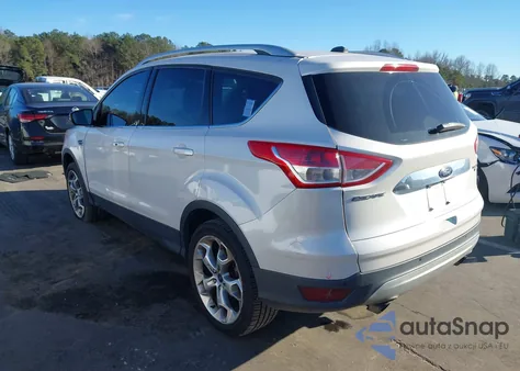 2014 Ford Escape Titanium z USA, uszkodzony, nr VIN 1FMCU9J92EUA51045
